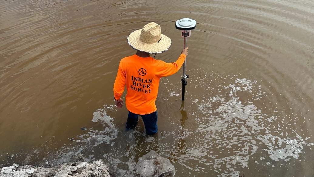 CREW AND GPS UNIT GETTING WATER ELEVATIONS